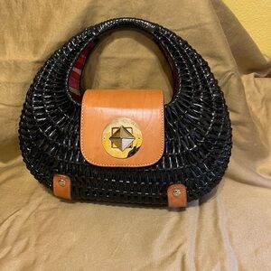 Kate Spade Black and Tan Crescent Bag with Gold Accent and leather trim